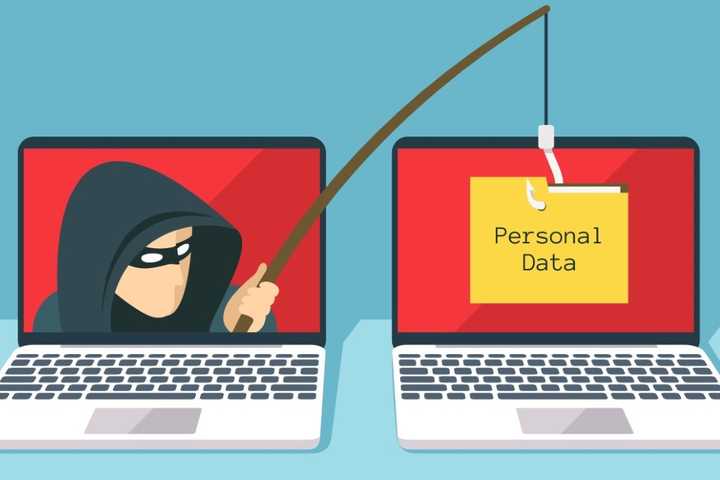 Illustration of a scammer stealing personal data from a laptop