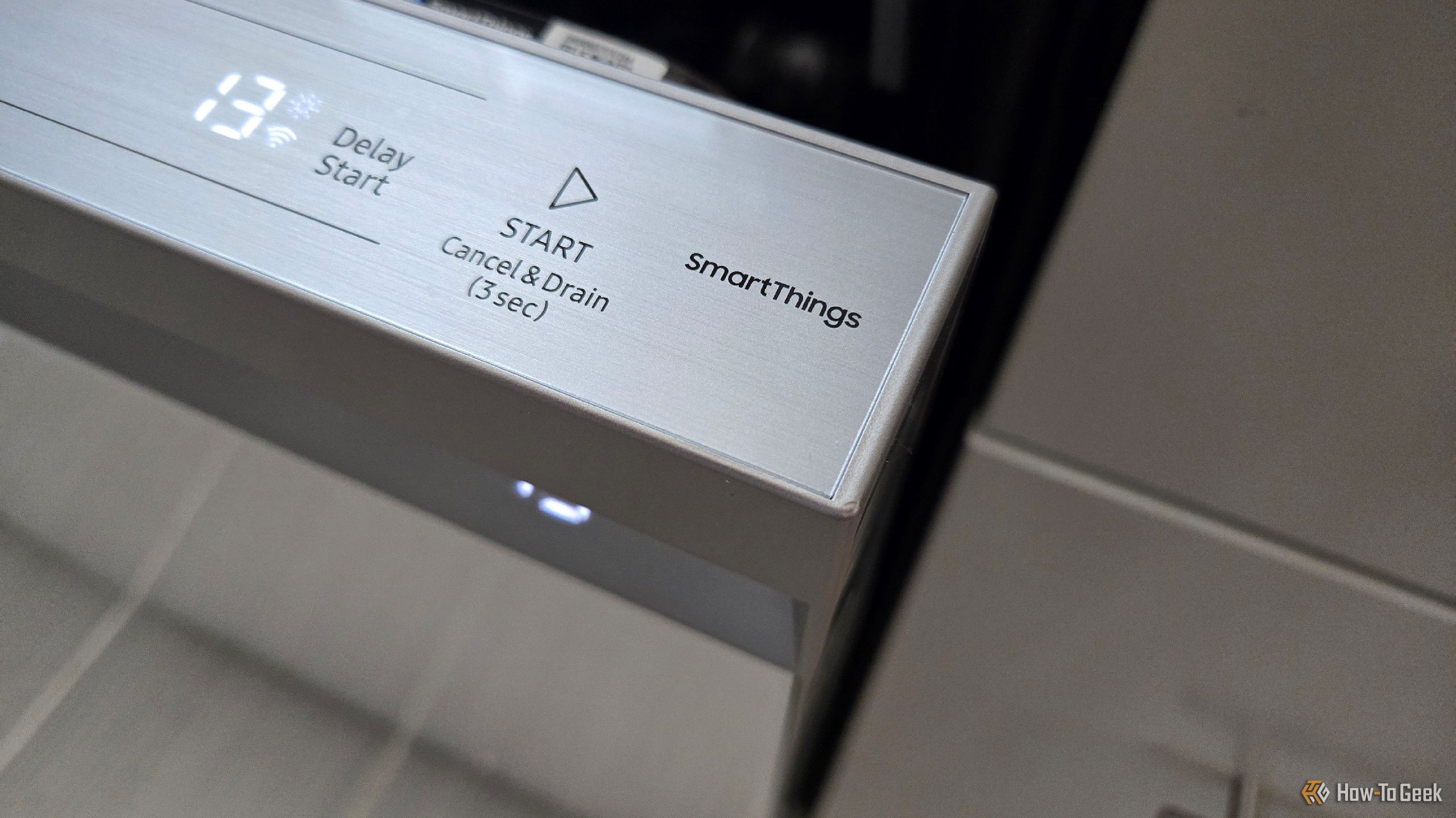 The SmartThings logo on a Samsung Bespoke dishwasher. 