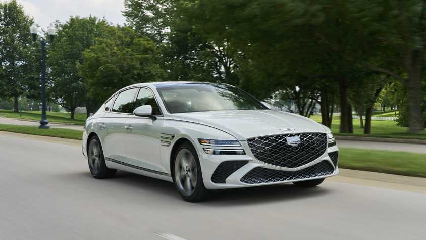 Front 3/4 action shot of a 2025 Genesis G80