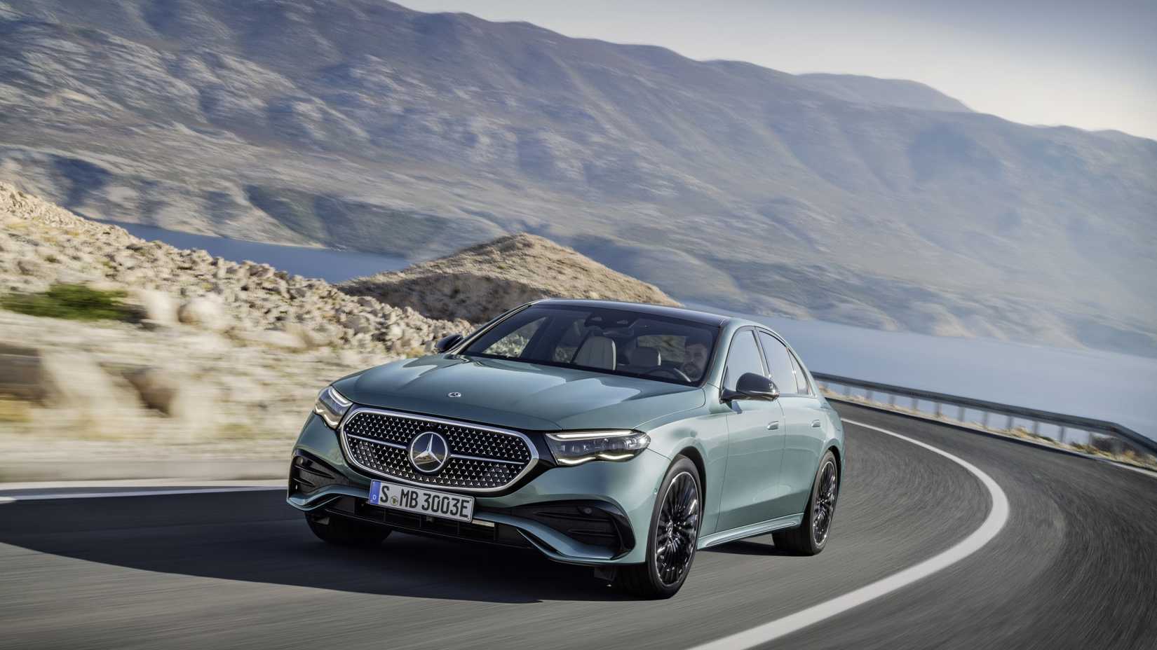 Front 3/4 action shot of a 2025 Mercedes-Benz E-Class