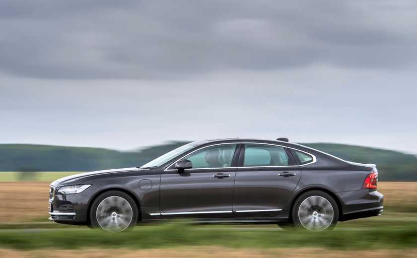 Side profile action shot of a 2025 Volvo S90 