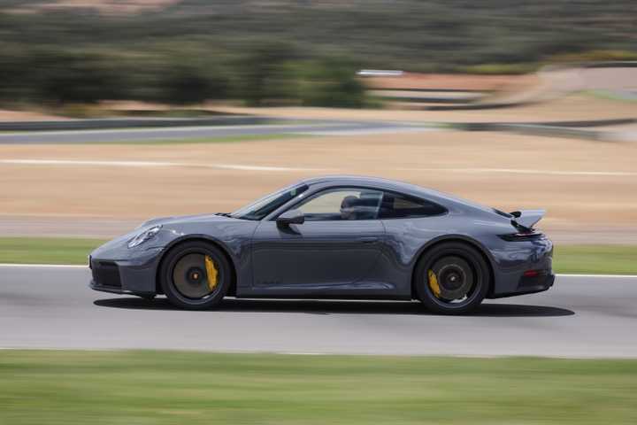 Side profile action shot of a 2025 Porsche 911 Carrera GTS