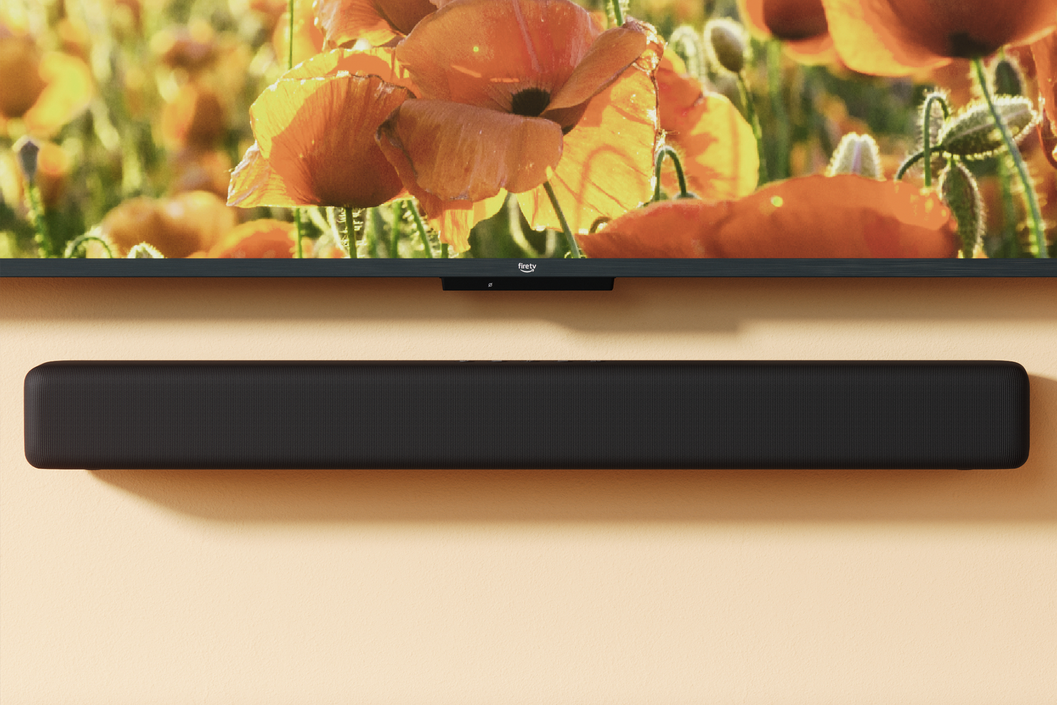 Amazon Fire TV Soundbar mounted under a Fire TV.
