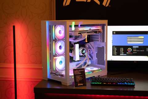 A gaming PC with Kingston memory, RGB fans, lights, MSI CPU cooler, and GeForce RTX GPU.