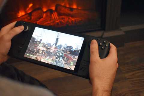 A person holding a Steam Deck as they play a game on it.