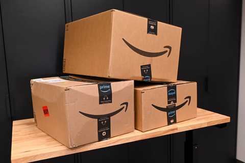 A stack of Amazon boxes on a table.