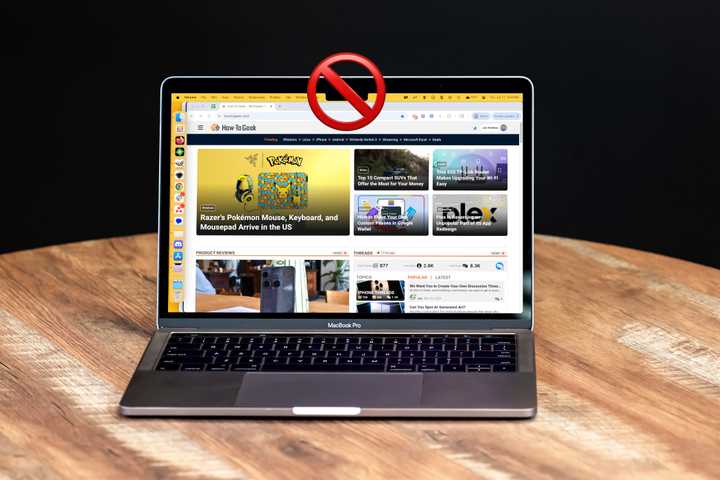 A MacBook Pro with the notch crossed out.