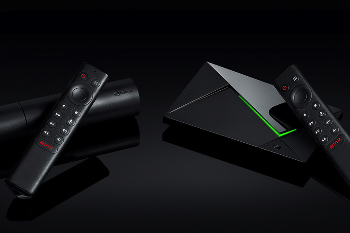 Two NVIDIA Shield TV devices on a black background. 