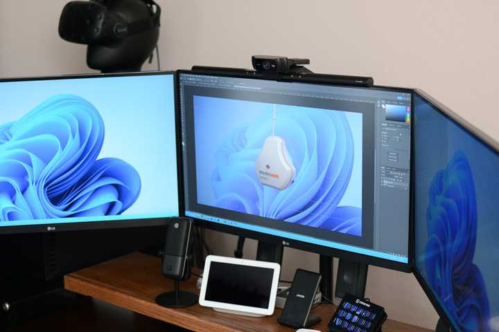A picture of a triple montor setup.