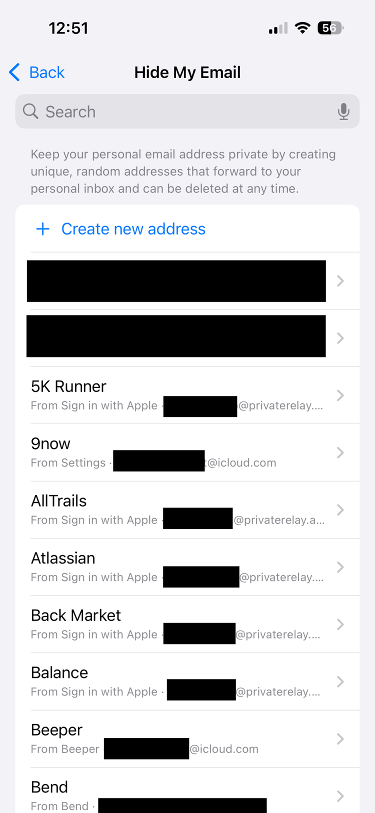 A list of Hide My Email address in the iCloud settings on an iPhone.
