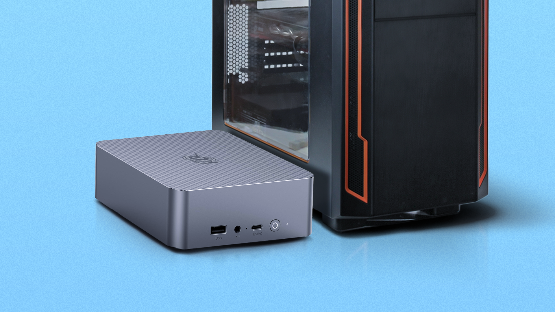 A mini PC placed beside a large desktop tower case, both set against a blue background.