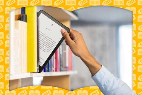A person taking a Kindle from a bookshelf full of books.