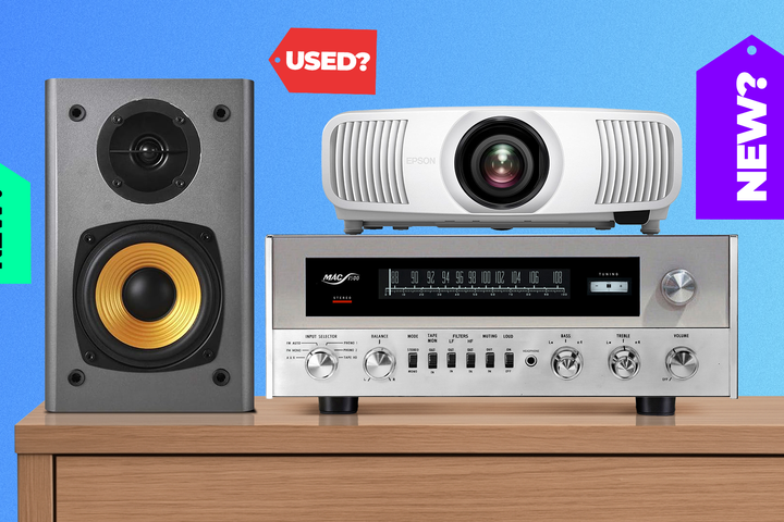 A projector, a receiver, and a speaker on a table, with tags saying 'NEW' and 'USED' around.
