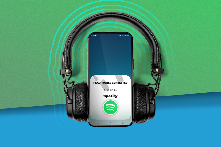 A smartphone with headphones and an app being opened.