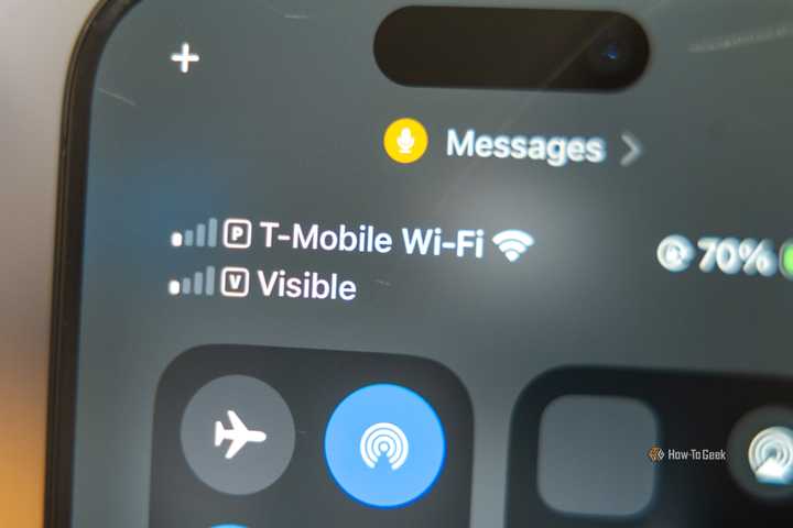 T-Mobile and Visible signal bars on an iPhone.