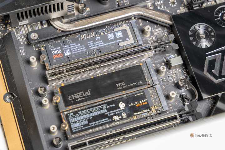 The Samsung 9100 PRO NVMe SSD installed in a motherboard with other M.2 drives.