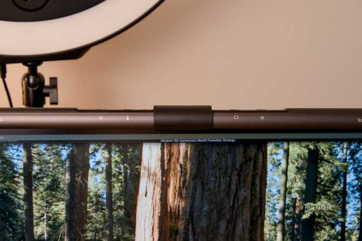 The Quntis ScreenLinear Monitor Light Bar sitting on a monitor.