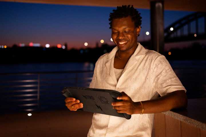 A man playing on the Acer Nitro Blaze 11.