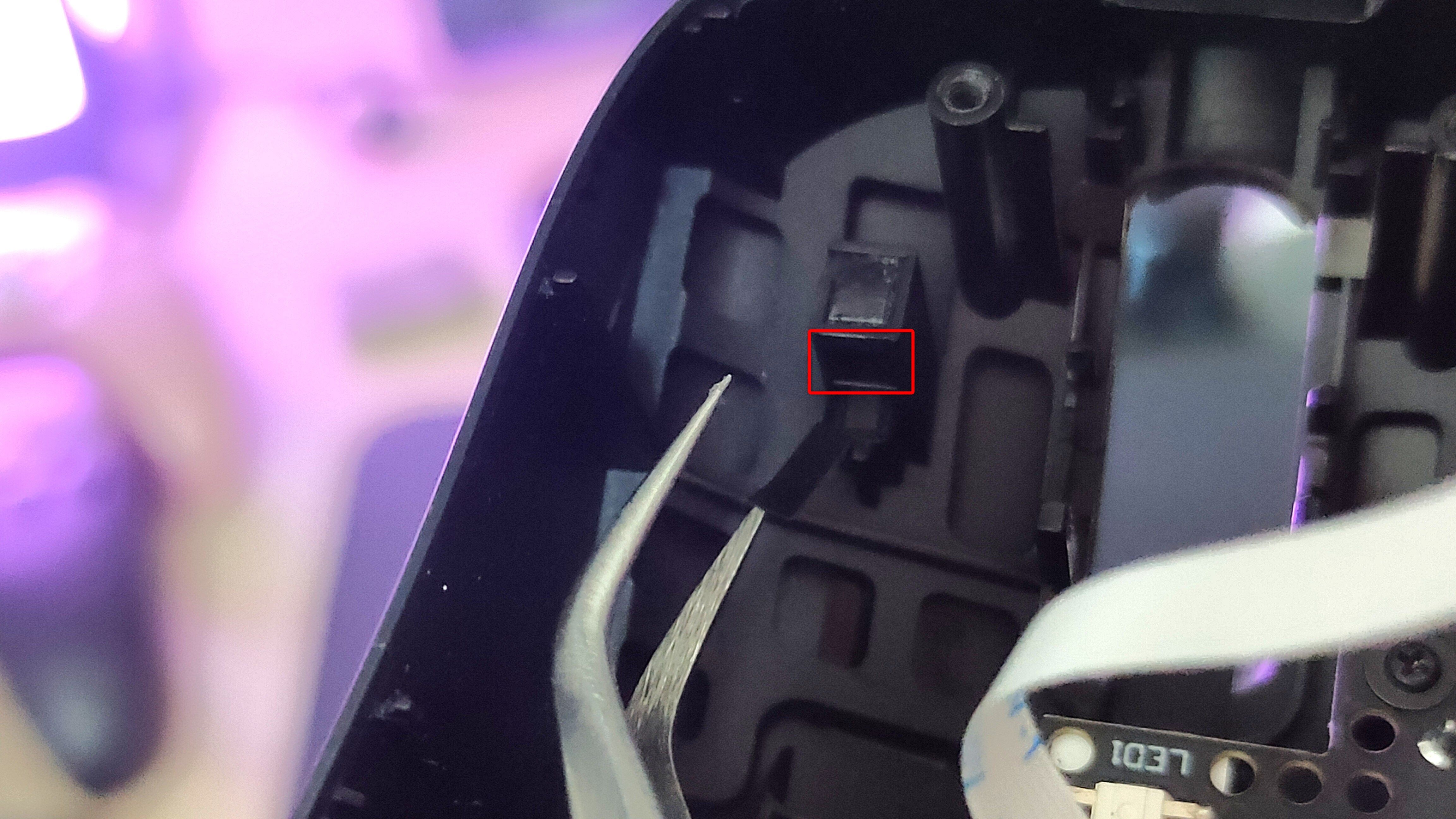 Adding tape underneath a mouse plunger.