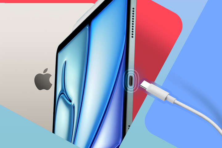 An iPad with a close-up view of its USB-C port, positioned between colorful red and blue backgrounds, with a white USB-C cable approaching the port from the right.