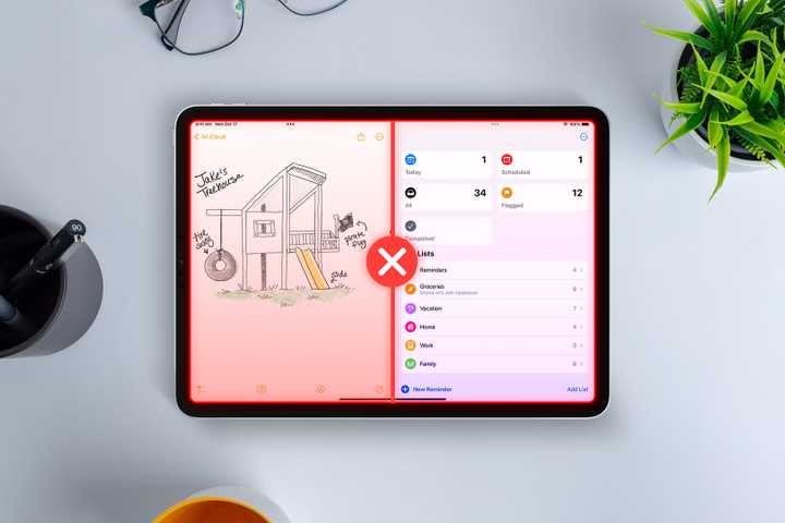 An iPad with the multitasking feature and an 'X' in the center.