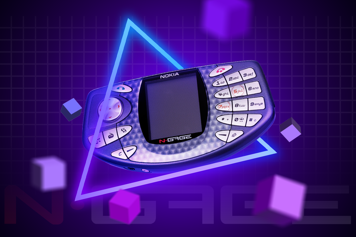 An N-Gage on a purple gradient background with a neon triangle around it and some cubes surrounding it.