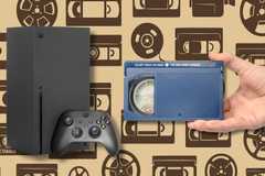 An Xbox Series X and Betamax tape on a vintage media.