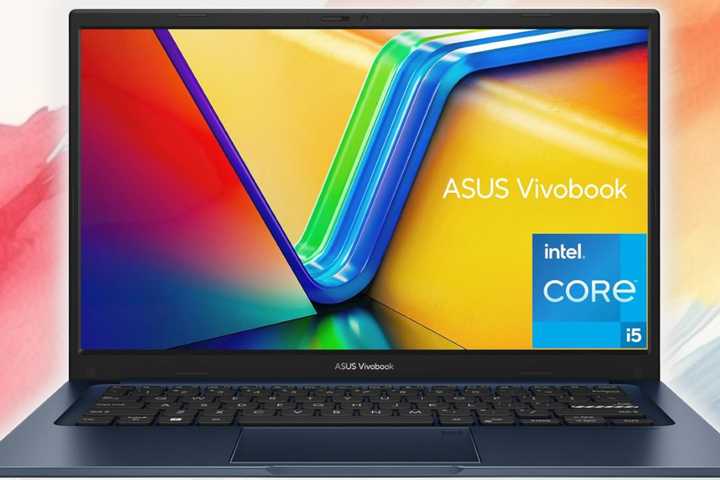ASUS 2023 Vivobook 14 Laptop on a painted background
