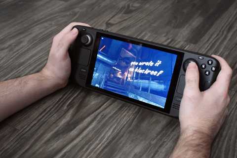 Person playing video game on Valve Steam Deck.