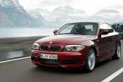 Front 3/4 action shot of a 2012 BMW 1-Series Coupe
