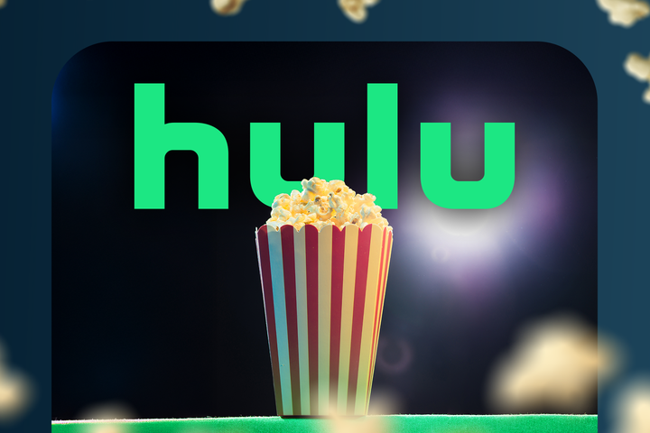 Bucket of popcorn in front of the Hulu logo, with popcorn pieces floating around.