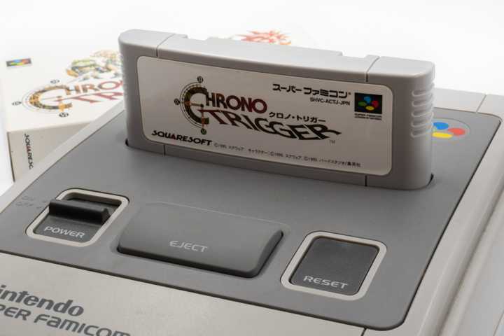 Chrono Trigger in a Super Famicom (SNES) console.