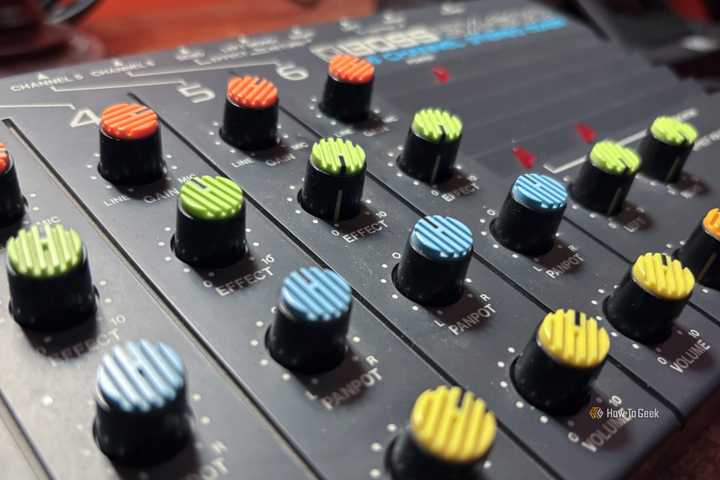 Close-up of the knobs on a Boss BX-600 mixer.