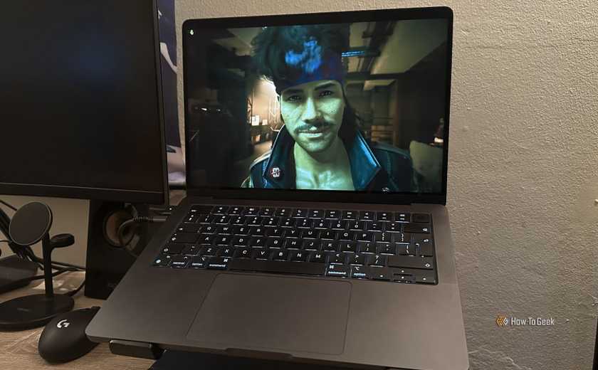 Cyberpunk 2077 running on a MacBook.