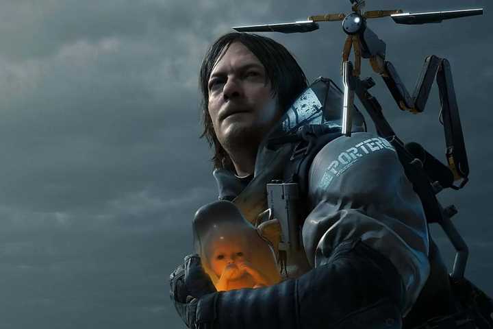 Sam Porter Bridges holding BB in Death Stranding.