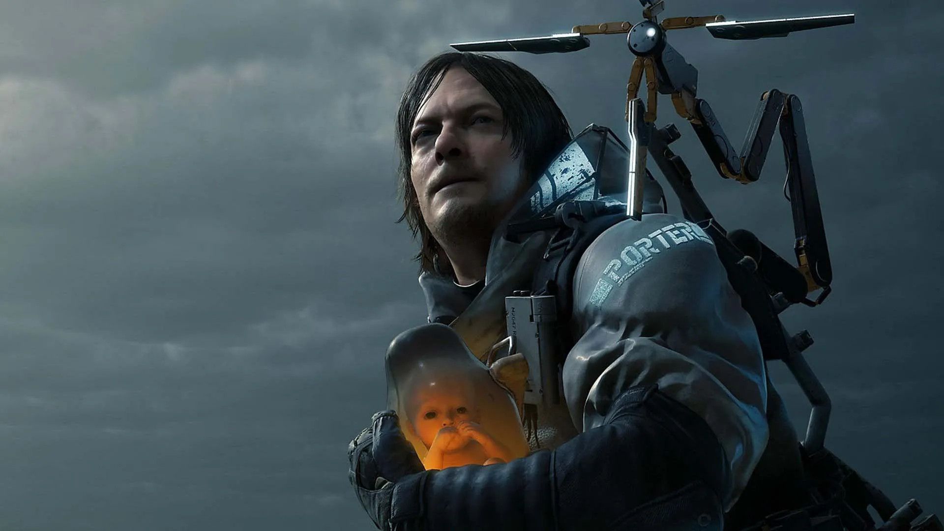 Sam Porter Bridges holding BB in Death Stranding.