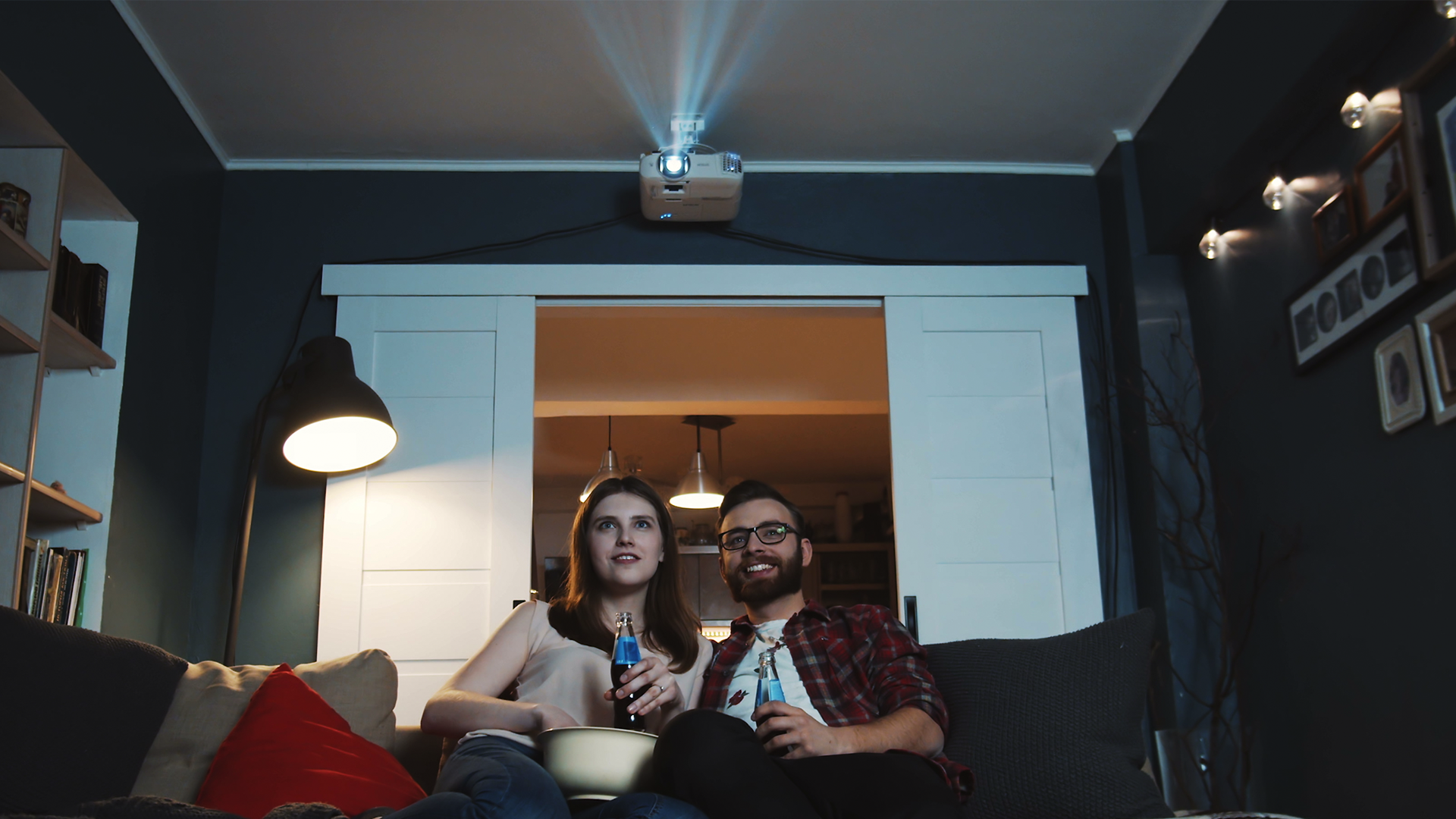 A family with a long-throw projector.