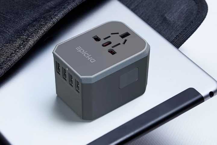 An EPICKA Universal Travel Adapter.