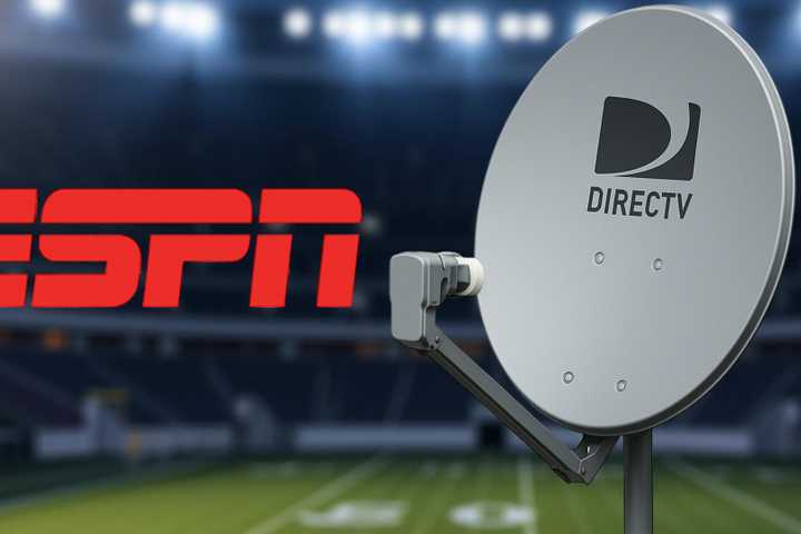 ESPN logo and DirecTV in front of a football stadium and lighting.