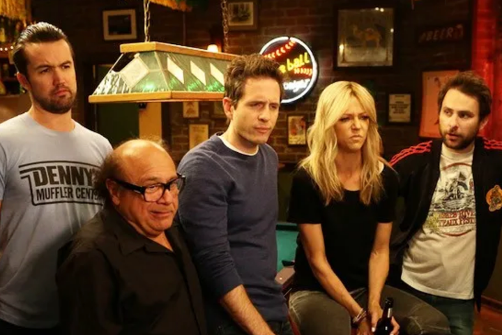 Mac, Frank, Dennis, Dee, and Charlie around pool table at Paddy's Pub.