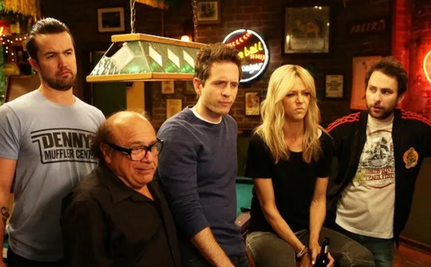 Mac, Frank, Dennis, Dee, and Charlie around pool table at Paddy's Pub.
