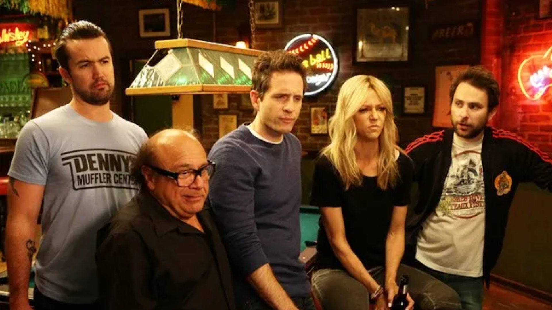Mac, Frank, Dennis, Dee, and Charlie around pool table at Paddy's Pub.