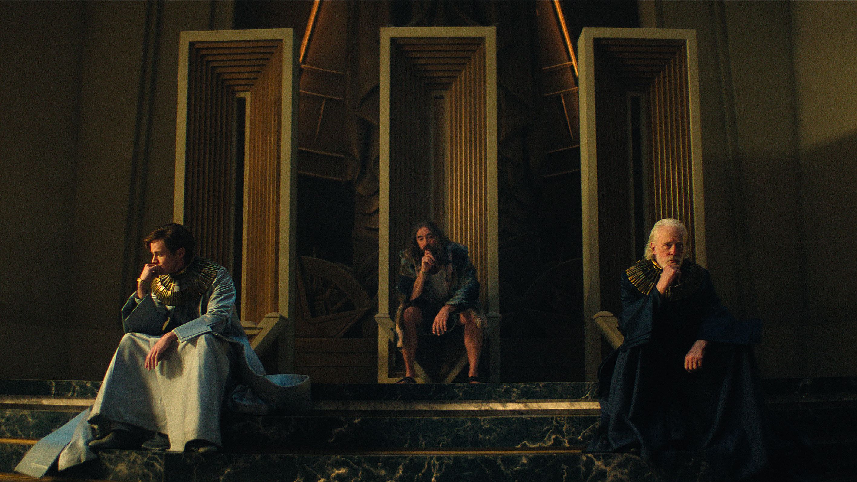 Cassian Bilton, Lee Pace, and Terrence Mann in Foundation.