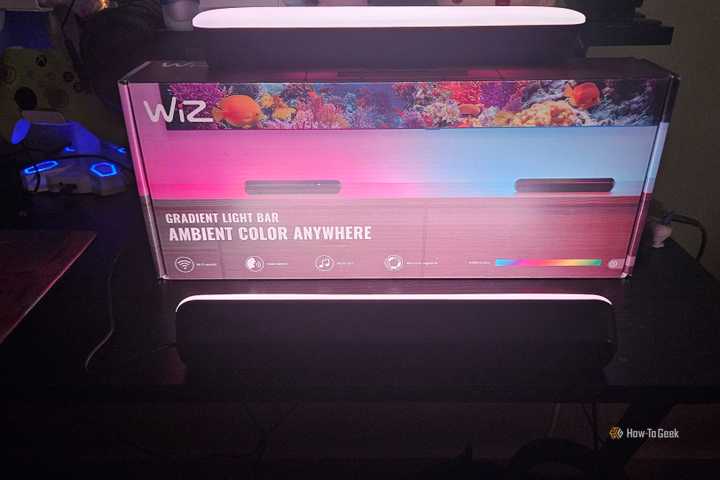 The WiZ Gradient Light Bars illuminating the box they came in.