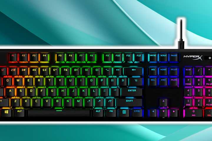 HyperX Alloy Origins keyboard on a colorful background.