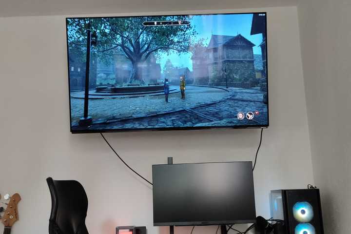 The Hisense 55A85K 55-inch 4K 120Hz OLED TV connected to a gaming PC playing The Elder Scrolls IV: Oblivion Remastered.