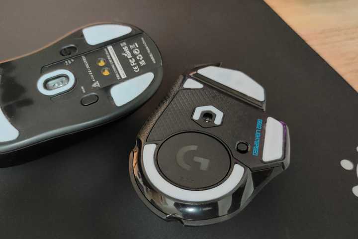 Custom mouse skates on the underside of the Logitech G502 Lightspeed and Ajazz AJ 179 Pro gaming mice.