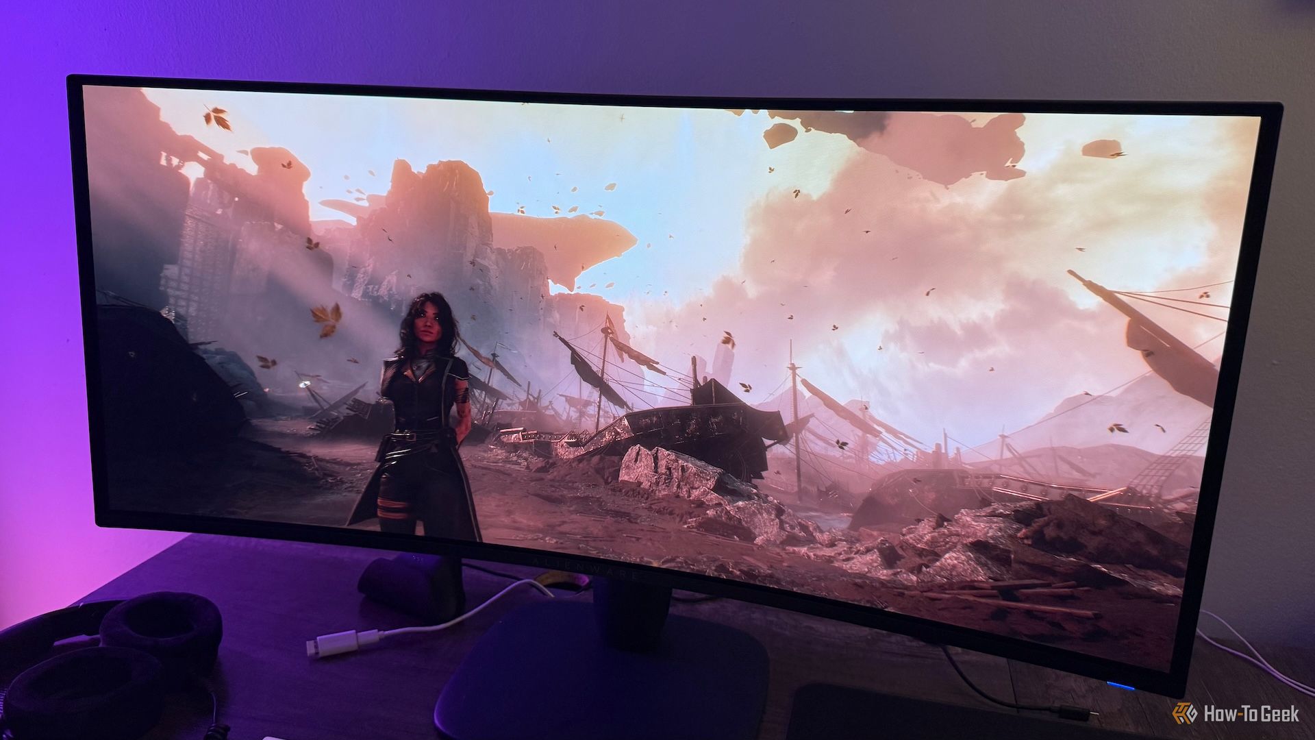 The Alienware AW3425DW curved ultrawide gaming monitor with Lune from Clair Obscur: Expedition 33 on it.