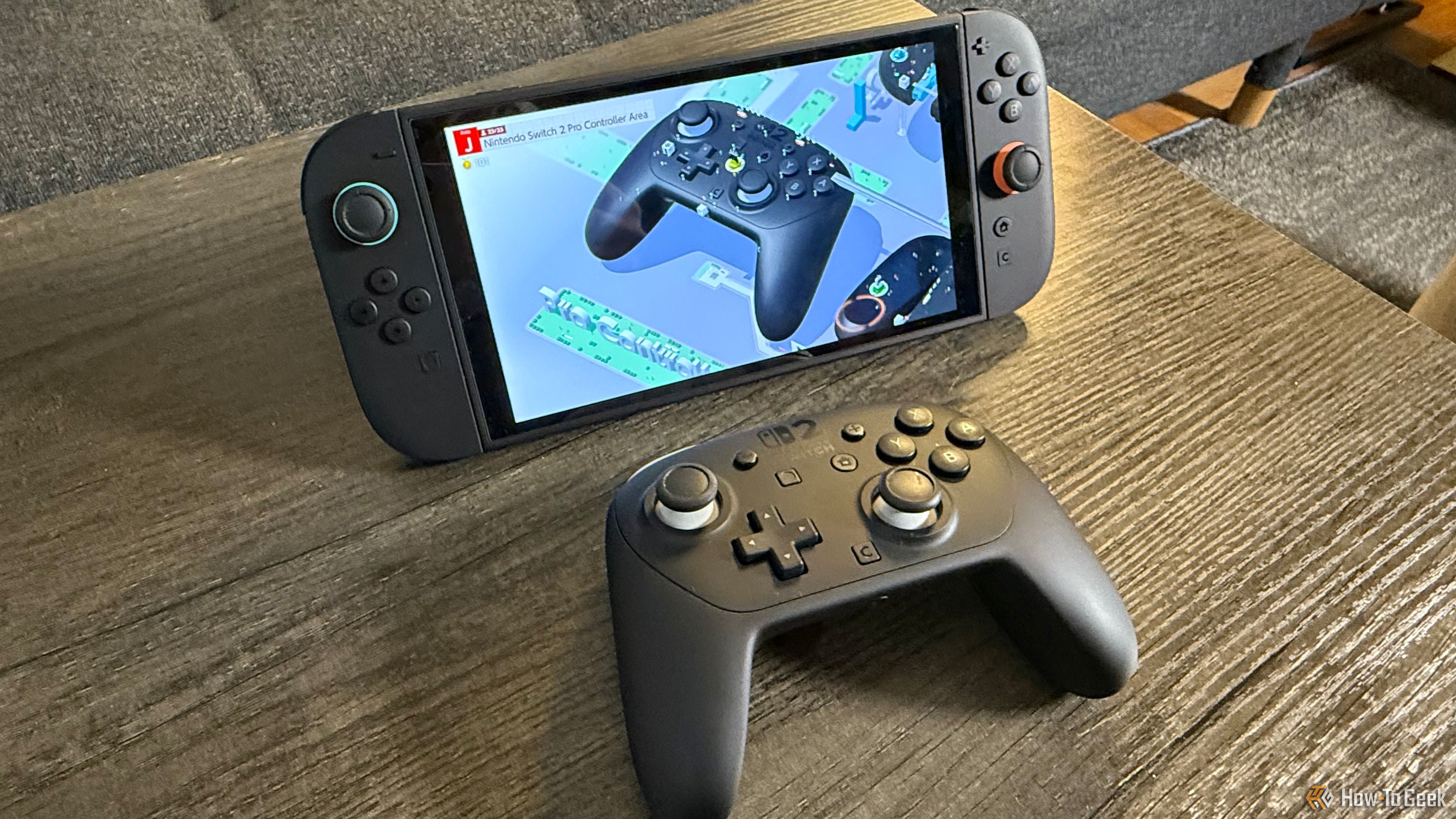 The Nintendo Switch 2 Pro Controller and a model of the pro controller in Nintendo Switch 2 Welcome Tour.