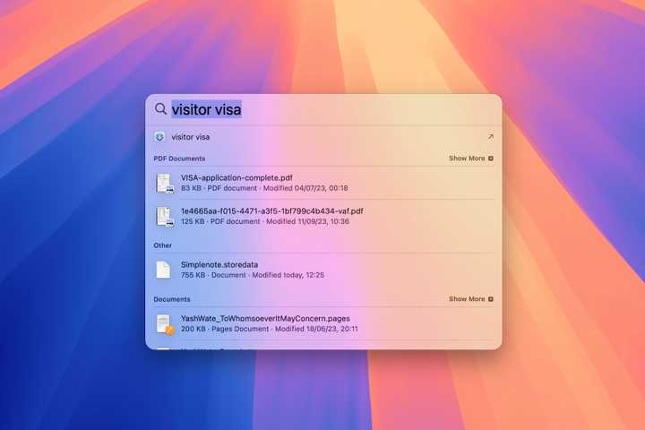 A Spotlght search window on the Mac desktop.